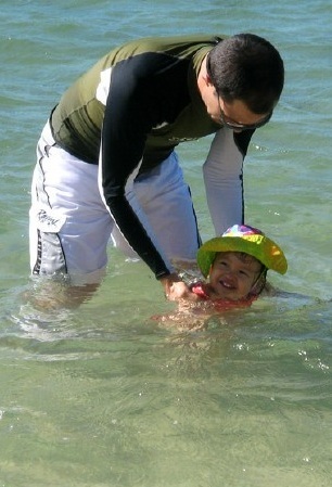 Enjoying ocean with baby